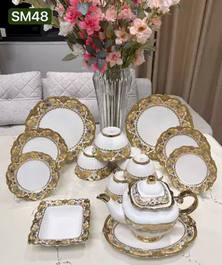 Porcelain dish set 64 pieces, with gold trim, with titanium effect — photo 3
